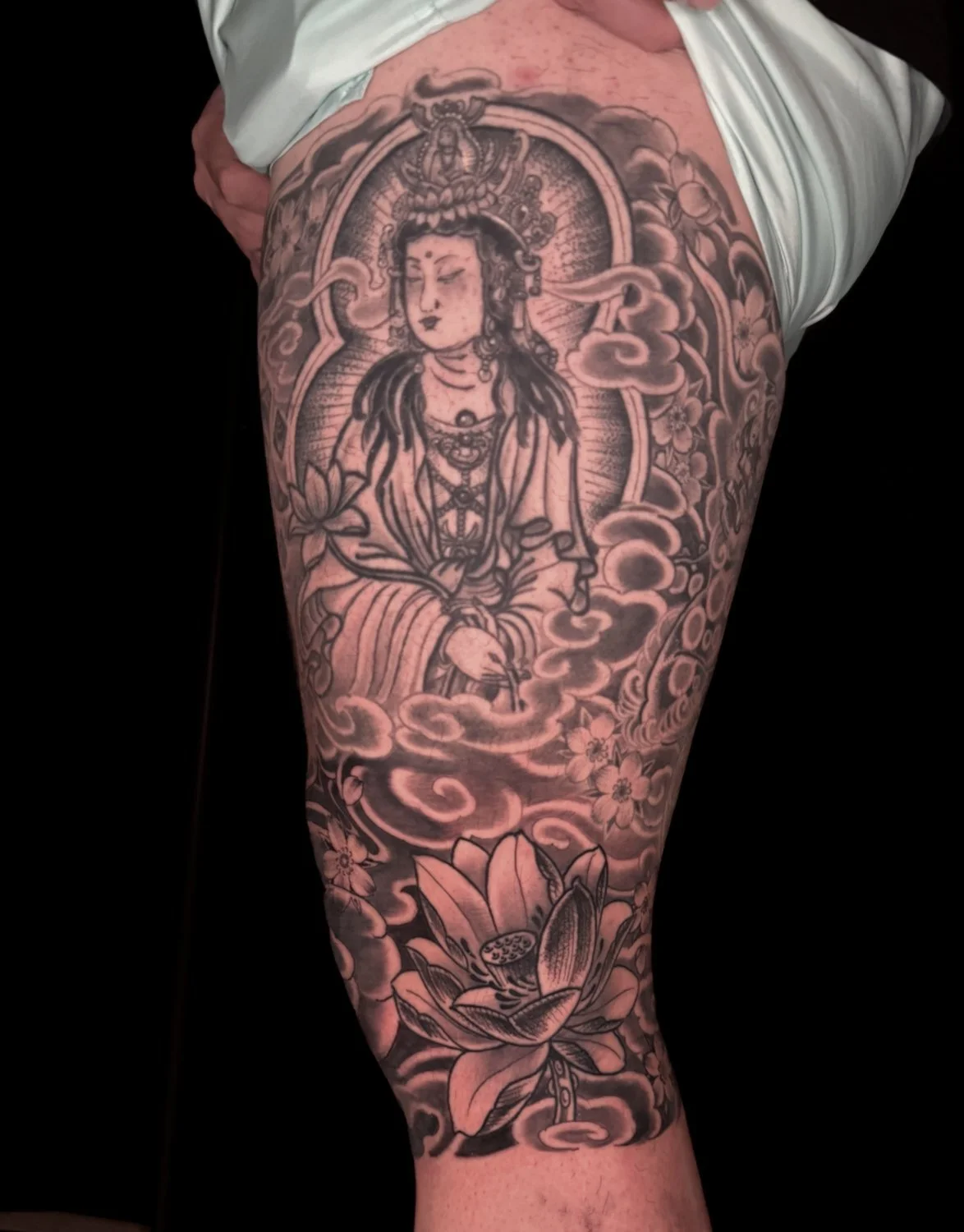kanon japanese tattoo with lotus flower black and gray 