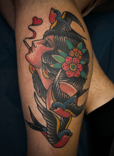 traditional american lady head tattoo with swallows and cigarrette