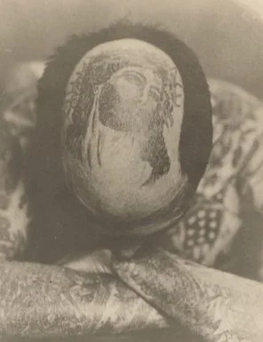 Vintage photo of Sailor Hugh Bowen's Christ head tattoo on his scalp by Percy Waters, around 1919