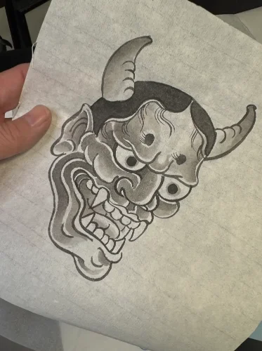 Hannya mask painted in sumi ink on rice paper, traditional Japanese style, by Chris Cockrill