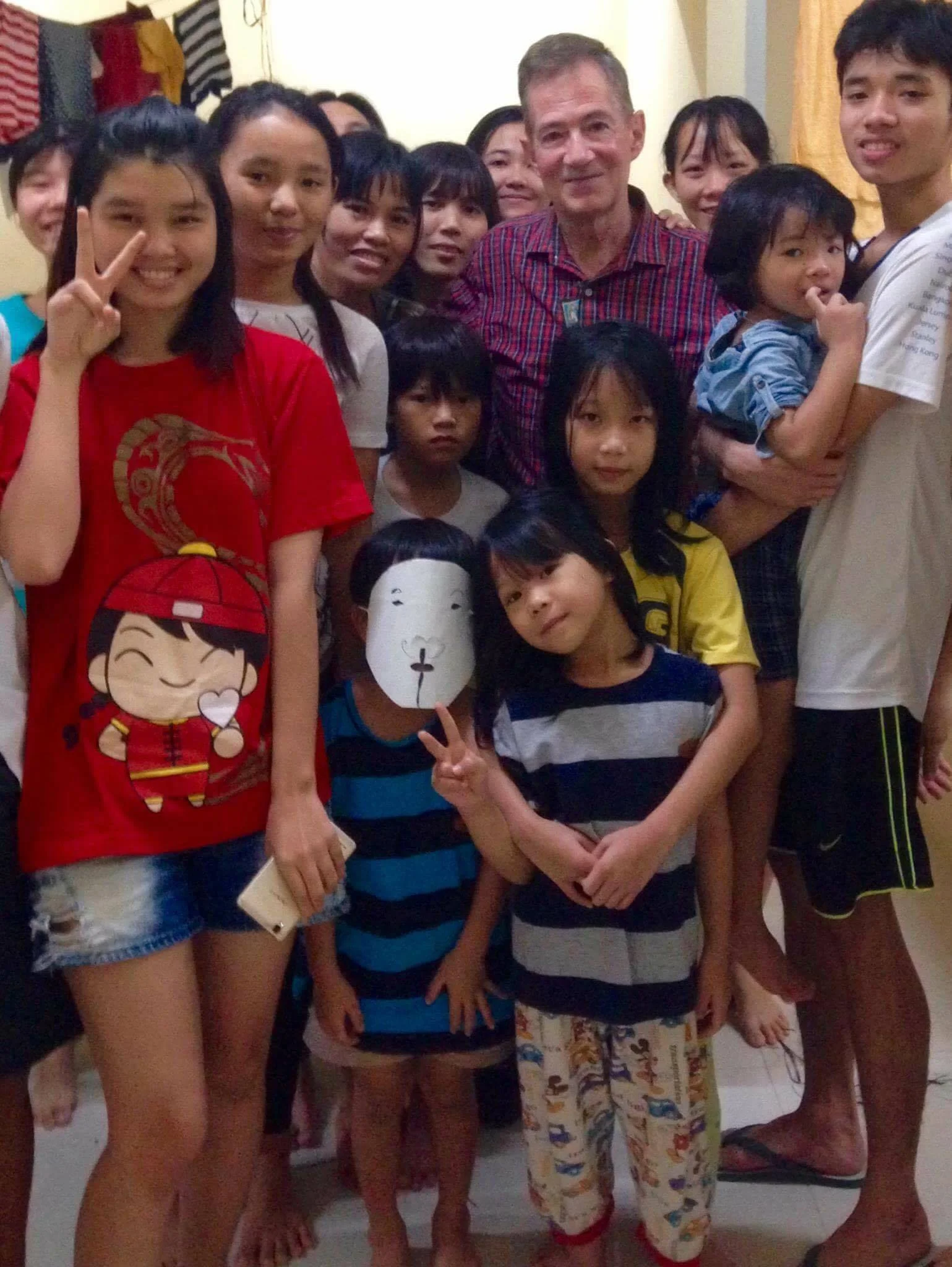 The group of 18 in Indonesia visited by retired US Ambassador Grover Joseph Rees. (Photo Courtesy: Võ An Đôn)
