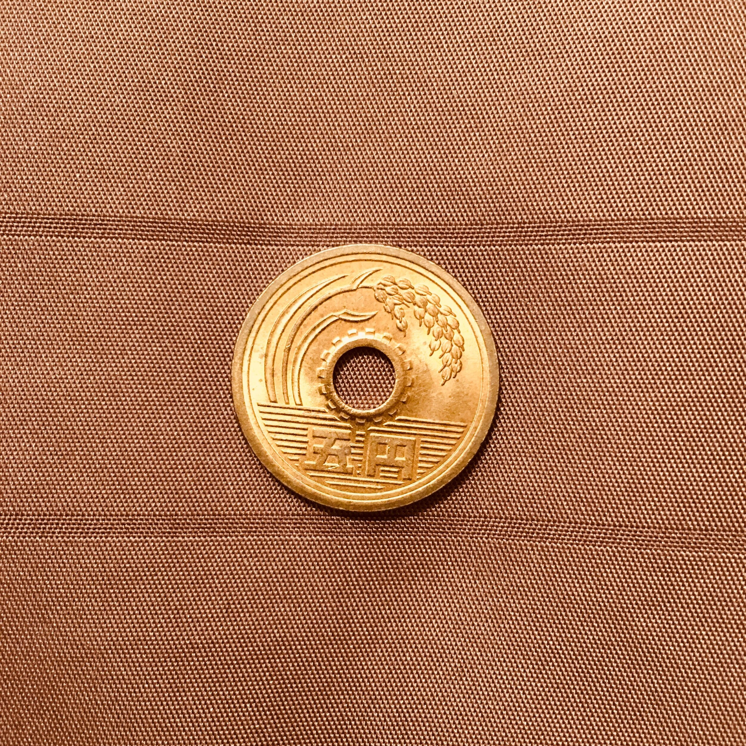  the five yen store cashier gave me. some said that it is a sign of fortune :)  