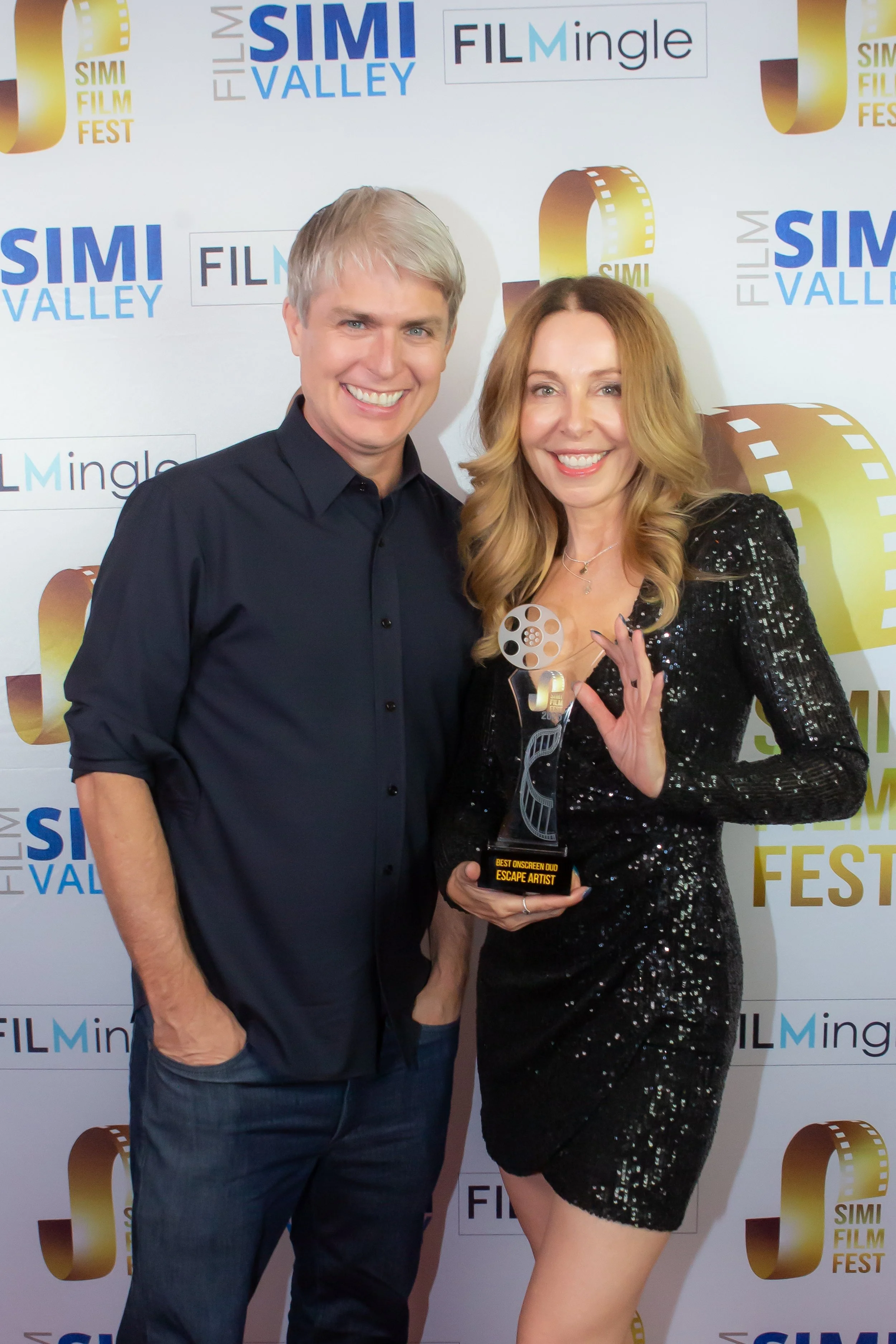 Accepting award for Escaoe Artist with writer Bo Price.JPG