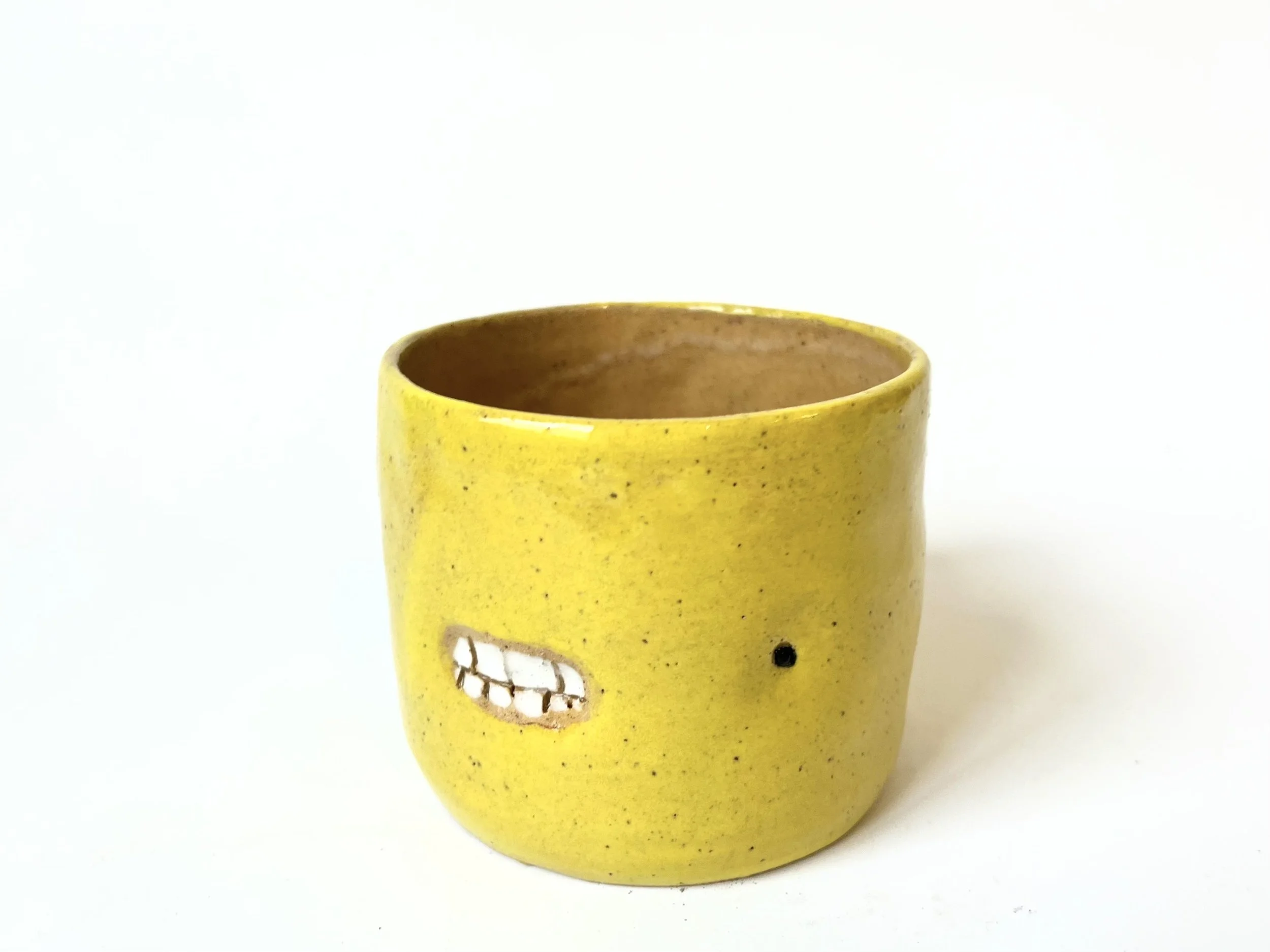 Yellow teethie cup, hand-built stoneware cup