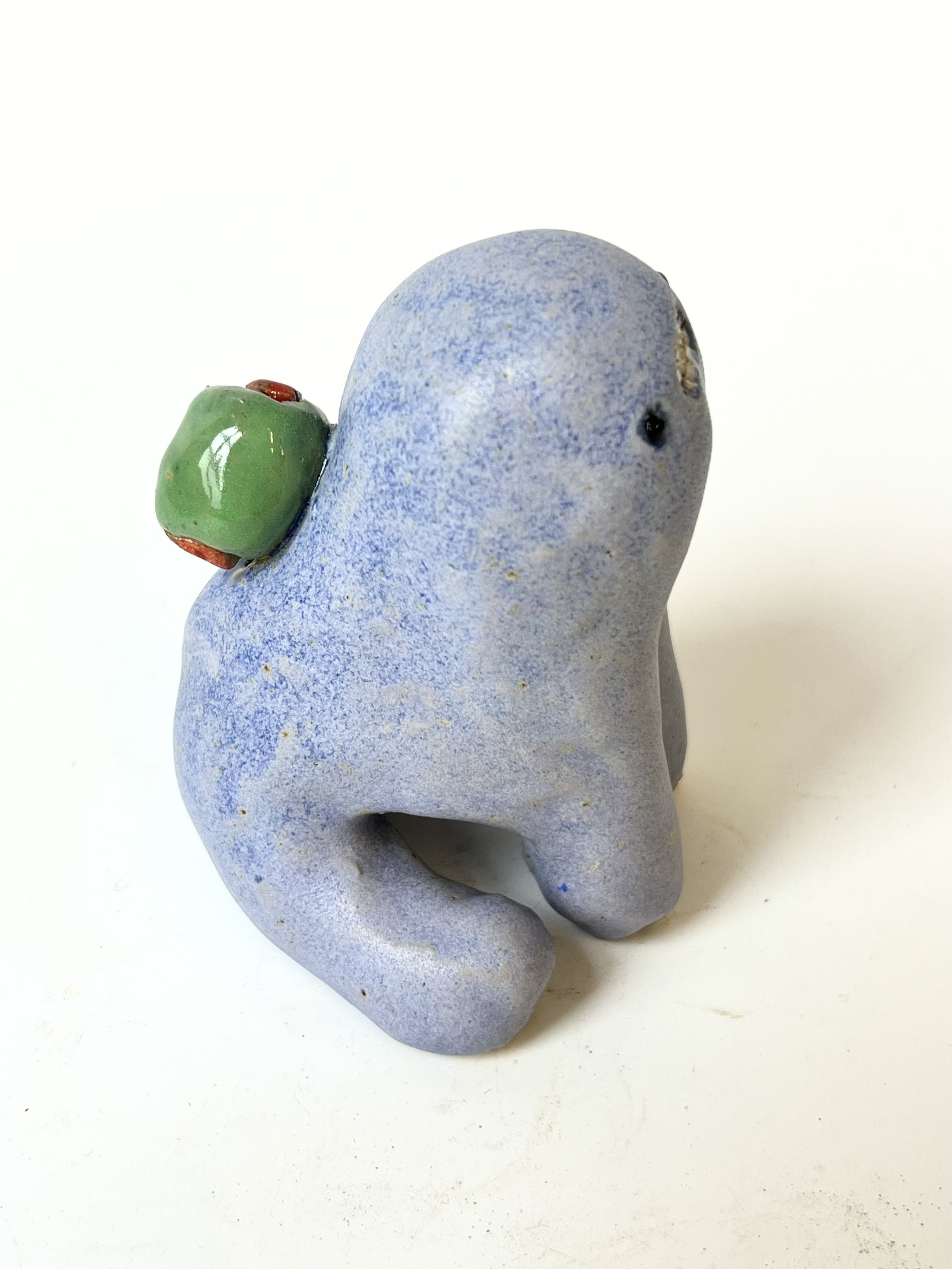 Mini Teethie, with a juicy delicious olive on its back