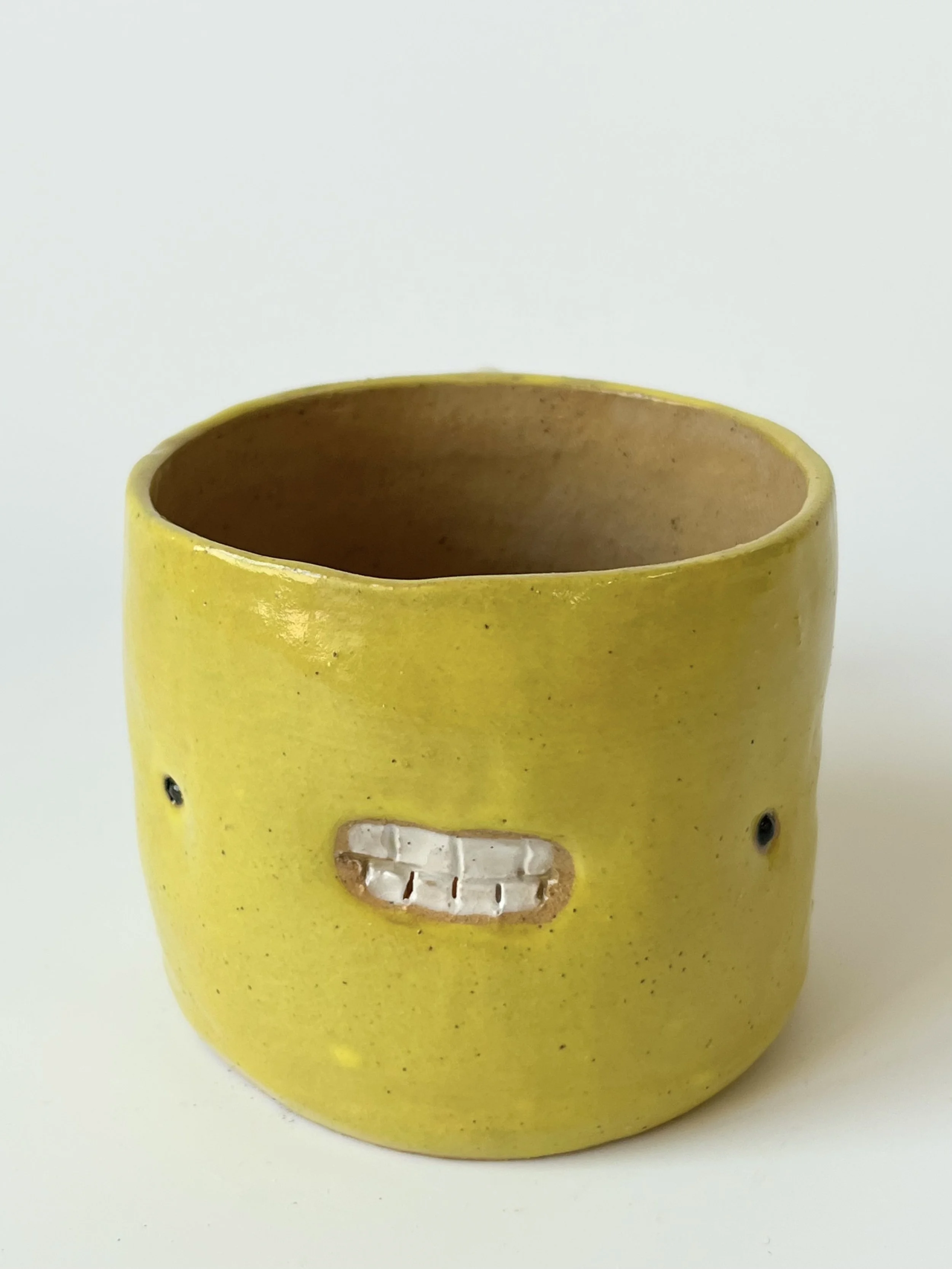 Yellow teethie cup, hand-built stoneware cup