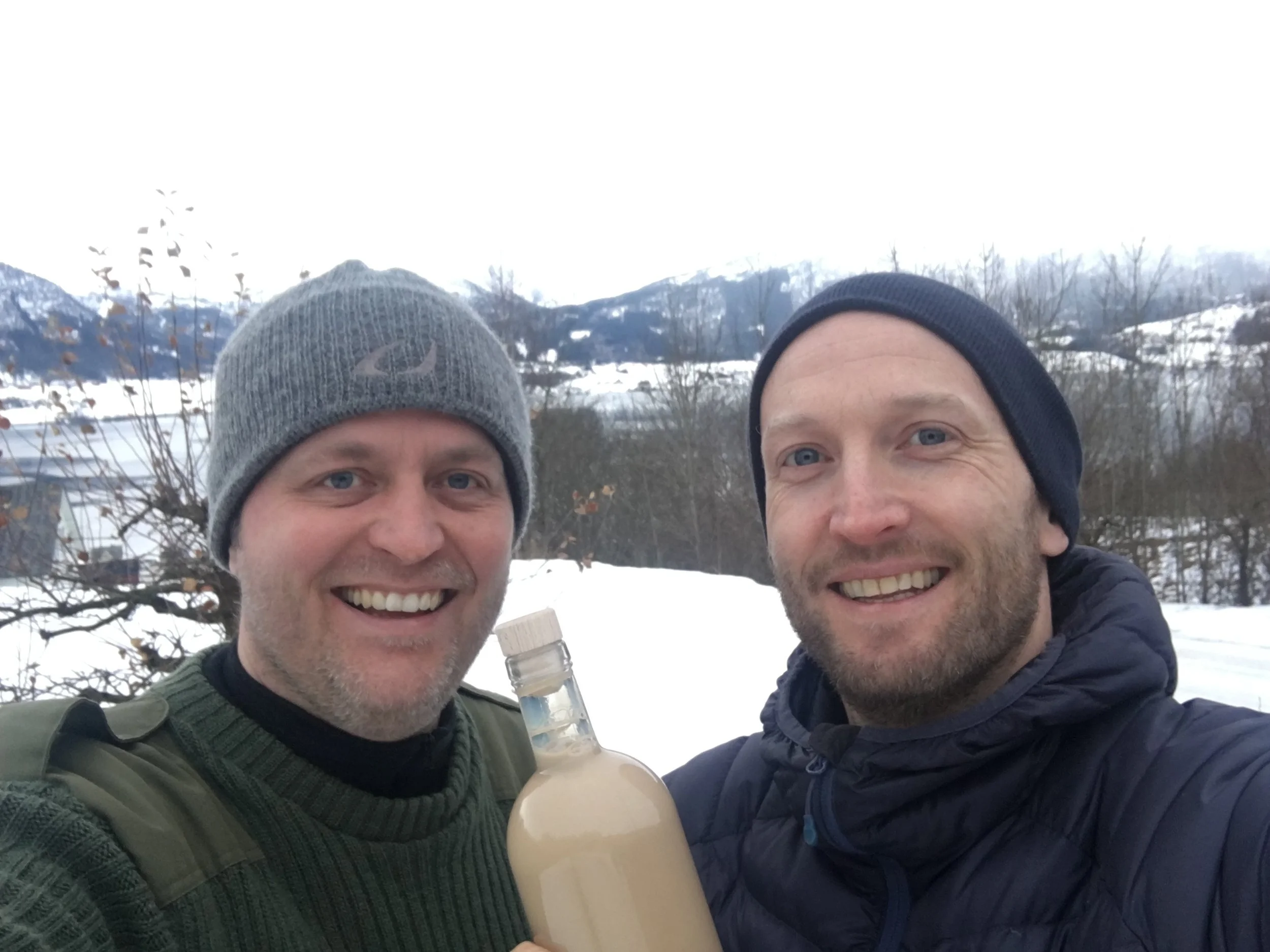 Jann Vestby and Øyvind Løkling with the first Fjording bottle. Gloppefjorden, a part of Nordfjorden, in the background. 