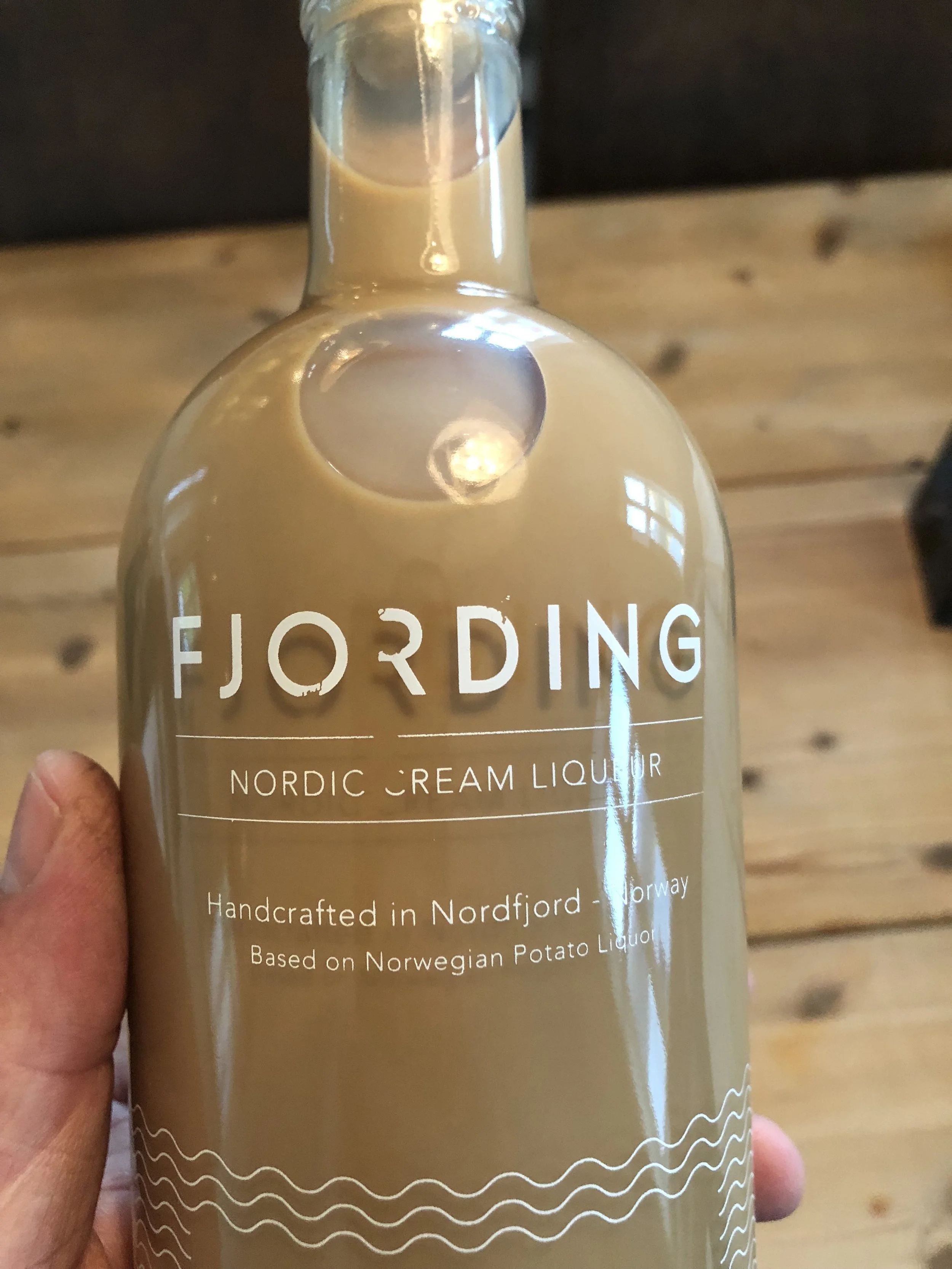 A bottle with print scratches after transportation . 