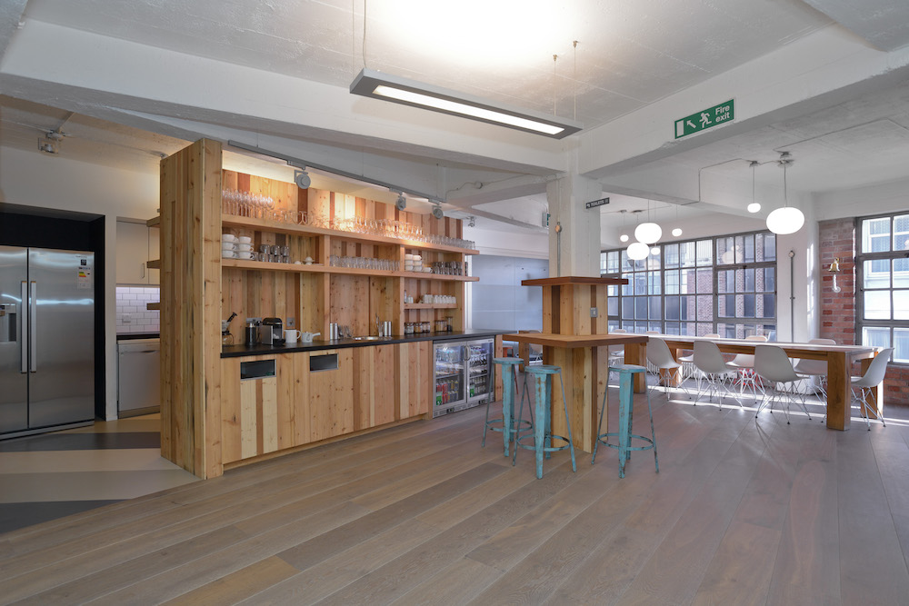 OUR TAKE: We achieved this ‘café culture’ look and feel for IDEO by incorporating different tables and chair styles, all centred on a kitchen and café bar.