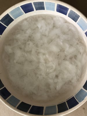 Soak in warm water to loosen