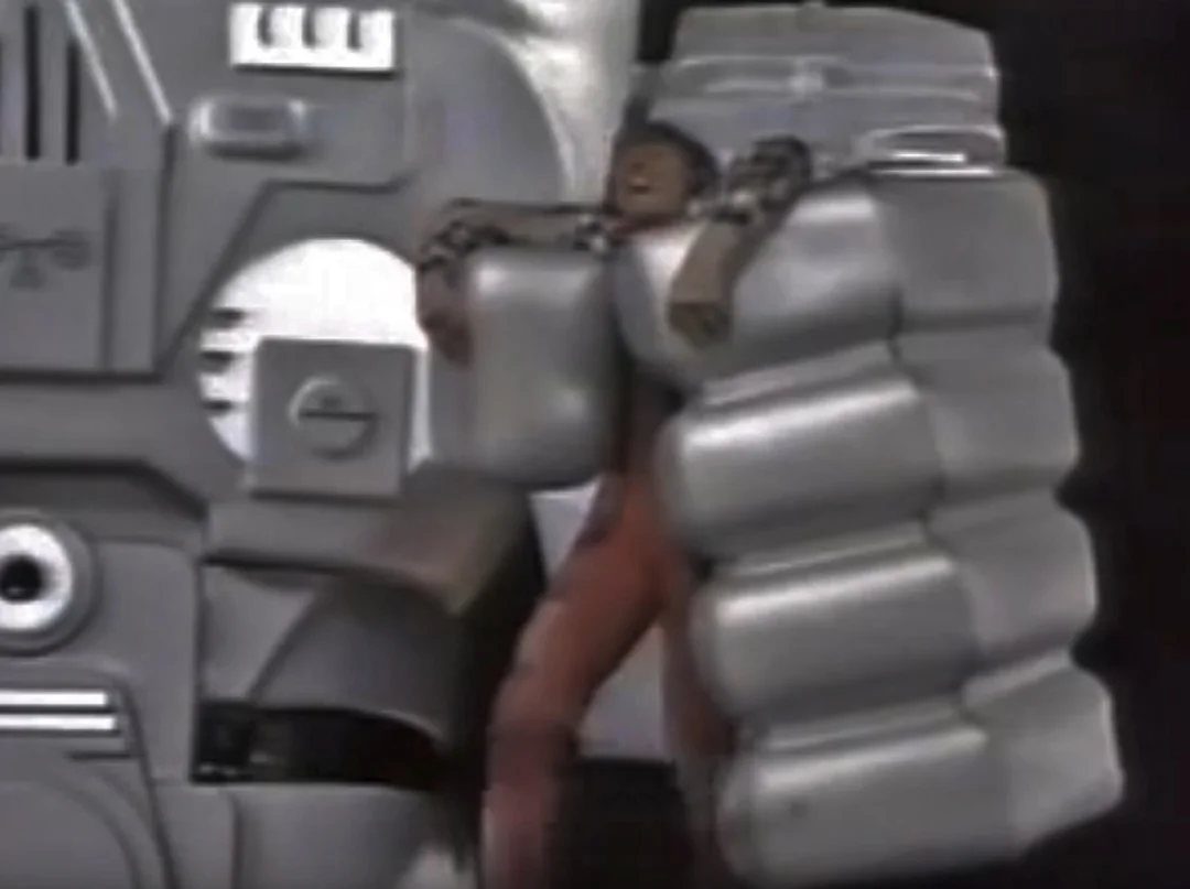 Quincy-in-the-Robot`s-grip-2.jpg