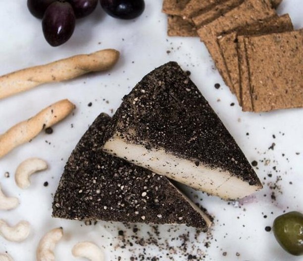 Cracked pepper crusted cashew cheese from @iamnutok - bringing you their artisan plant based cheese every Sunday at the market!⠀
⠀
#victoriaparkmarket #victoriapark #londonmarkets #eastlondon #cheese #vegan