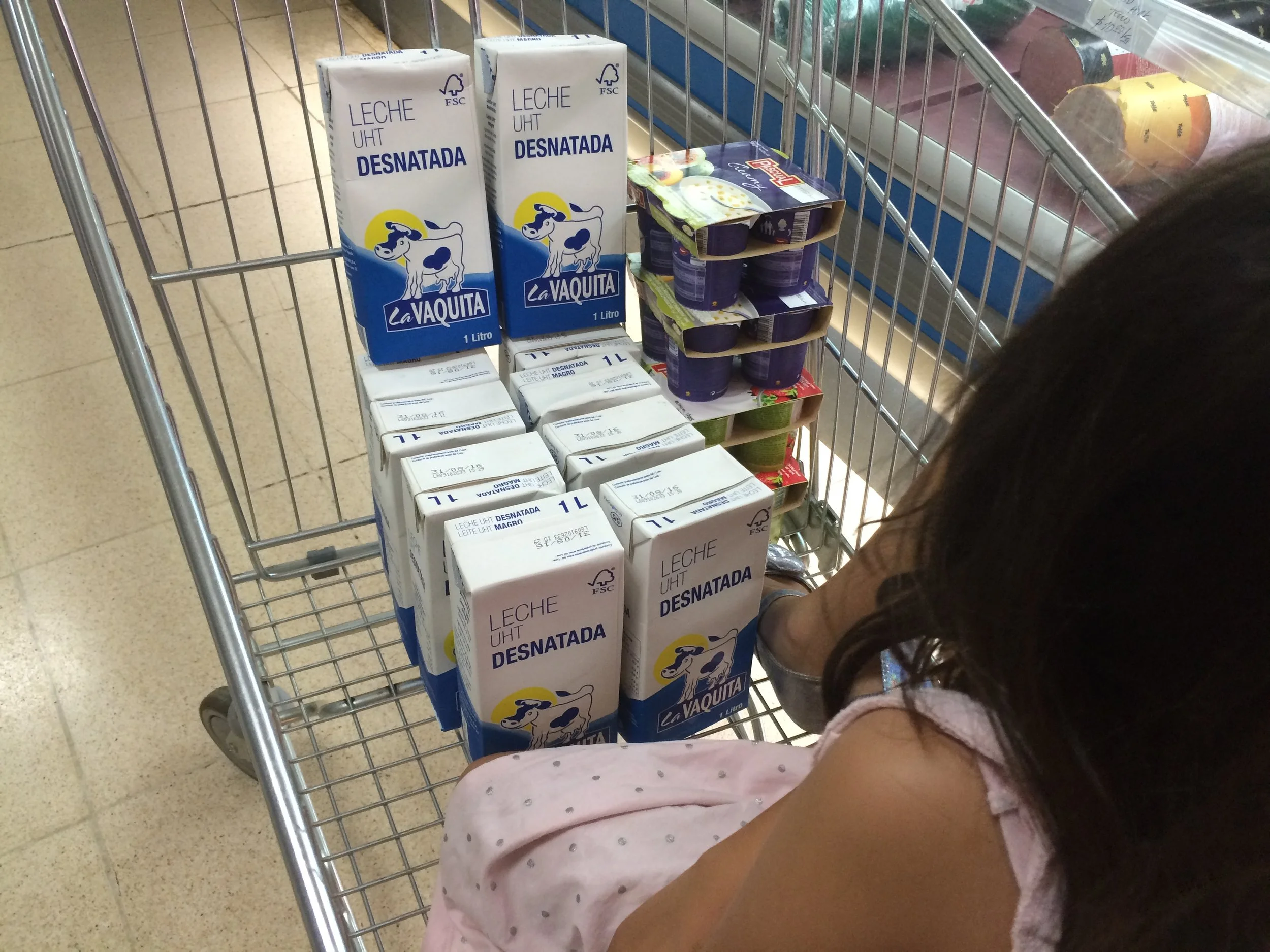 My daughter and I stocking up on milk at a not-so-super market in Havana, Cuba. 
