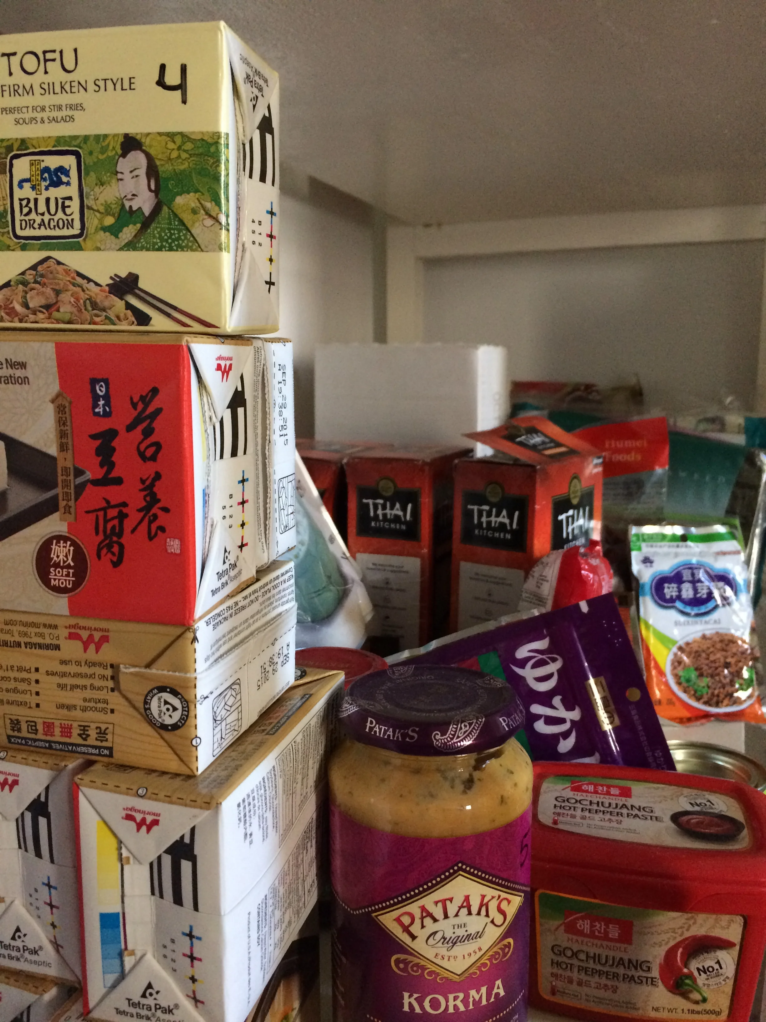 The very messy Asian section of my pantry. Except for the tofu, it wouldn't help much if we lost power and couldn't cook. 