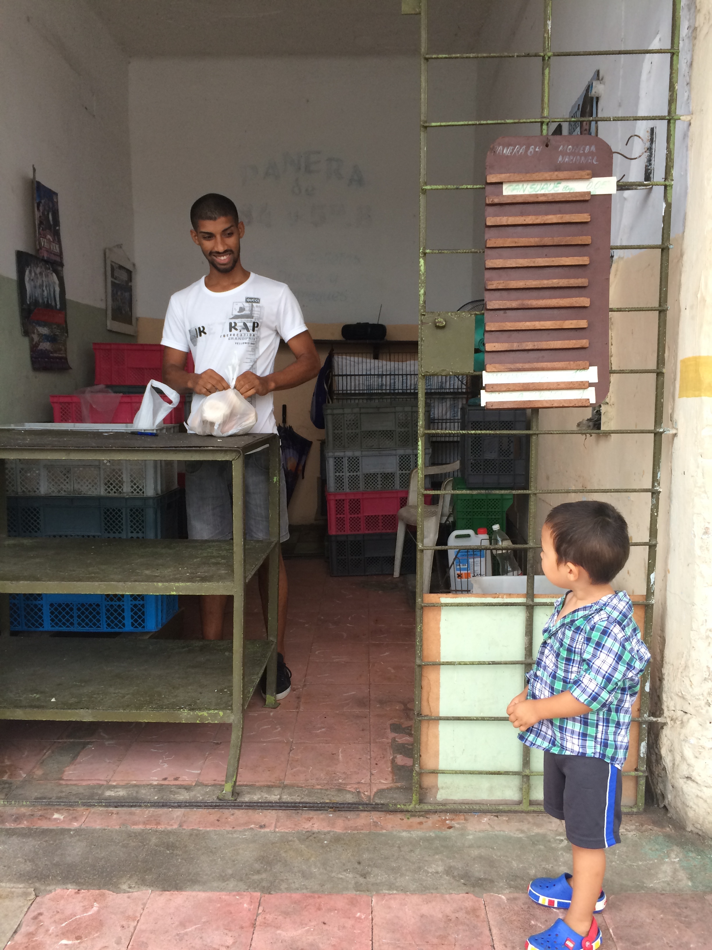 Buying Bread at the Neighborhood Bodega