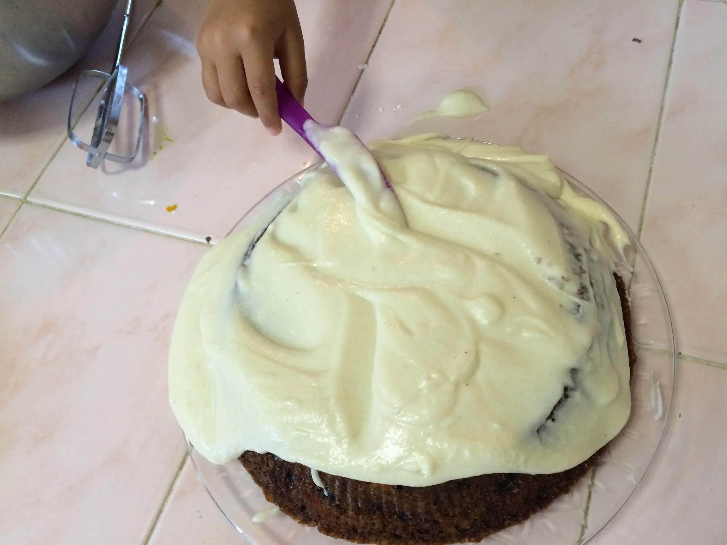 My daughter and I working on our first cake order. It wasn't exactly pretty, but it was delicious.