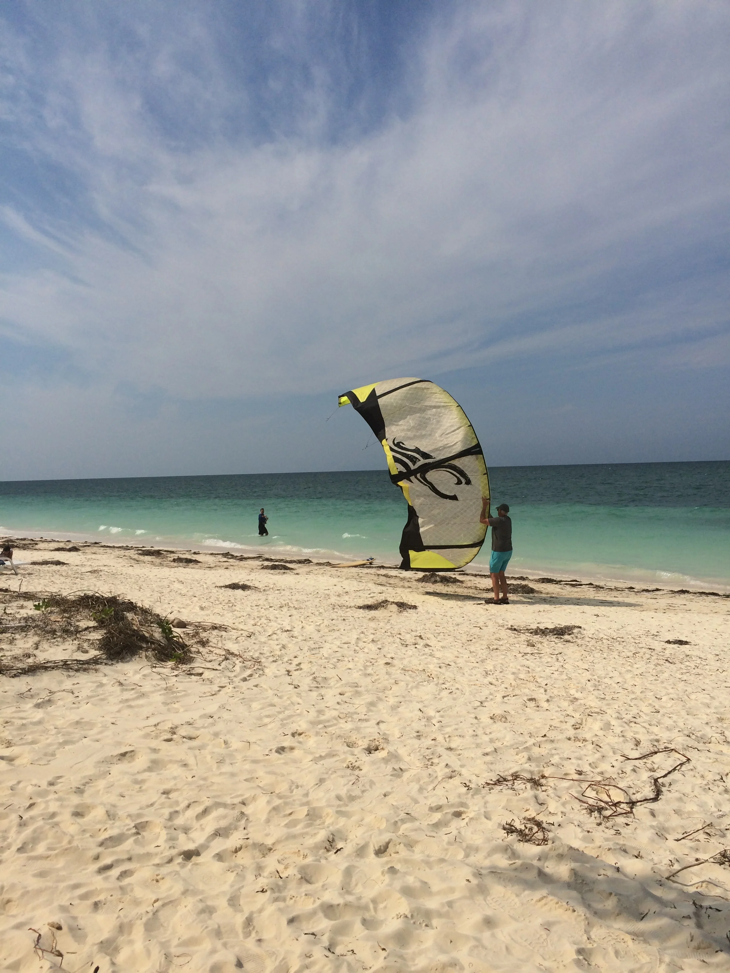 My husband launches his kiteboarding off the sandy beaches on Cayo Levisa.