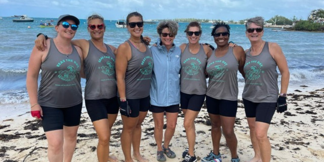  Pamela with her rowing squad on a windy day of waves and whitecaps at Mangrove Bay. 