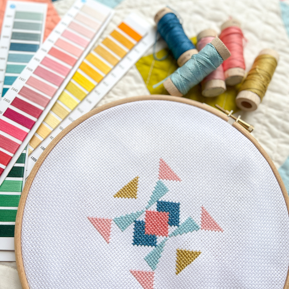 Collider cross stitch using Aurifil Floss.png