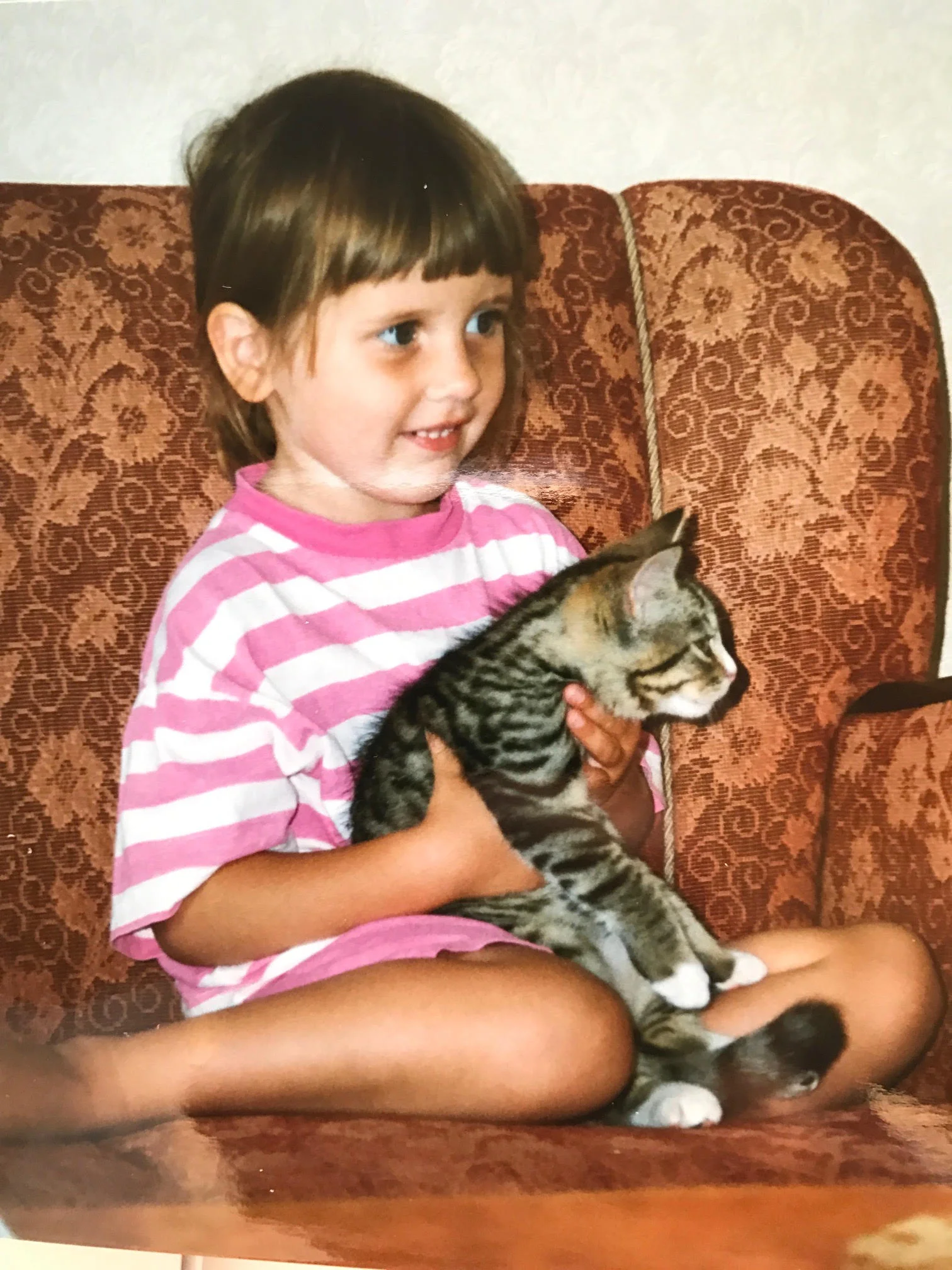 Here I am when I was four years old, with our first cat, Simba. The same year I decided I wanted to become a vet.
