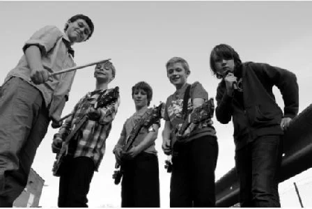 Will's second band, featuring Roman Banwell (Vocals), Will Cross (Lead Guitar), Adam Peters (Rhythm Guitar), James Warren (Bass Guitar), and Ali Rice (Drums) 5 Second Rule is a young band from the south-west of England, bringing to you indie rock originals, and an eclectic mix of classic and modern covers. Since receiving airplay from a number of major radio stations, including BBC Radio 2 and BBC Radio Bristol, they have gained more and more experience, recording two EPs since, featuring the catchy single 'Rose', playing a whole host of venues in the west, including the Fleece, Bristol. Facebook YouTube