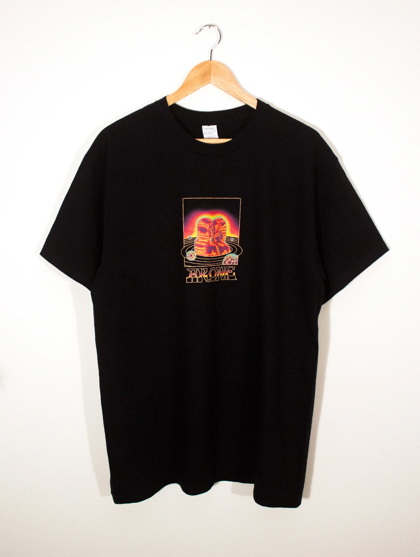 AK7-WEB-UNIVERSAL-TEE-BLACK-FRONT.jpg