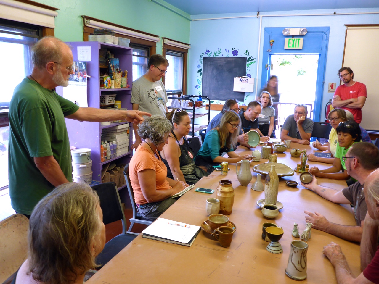 Jim Lorio Workshop Jim showing Wisconsin Potters work he likesJPG.jpg