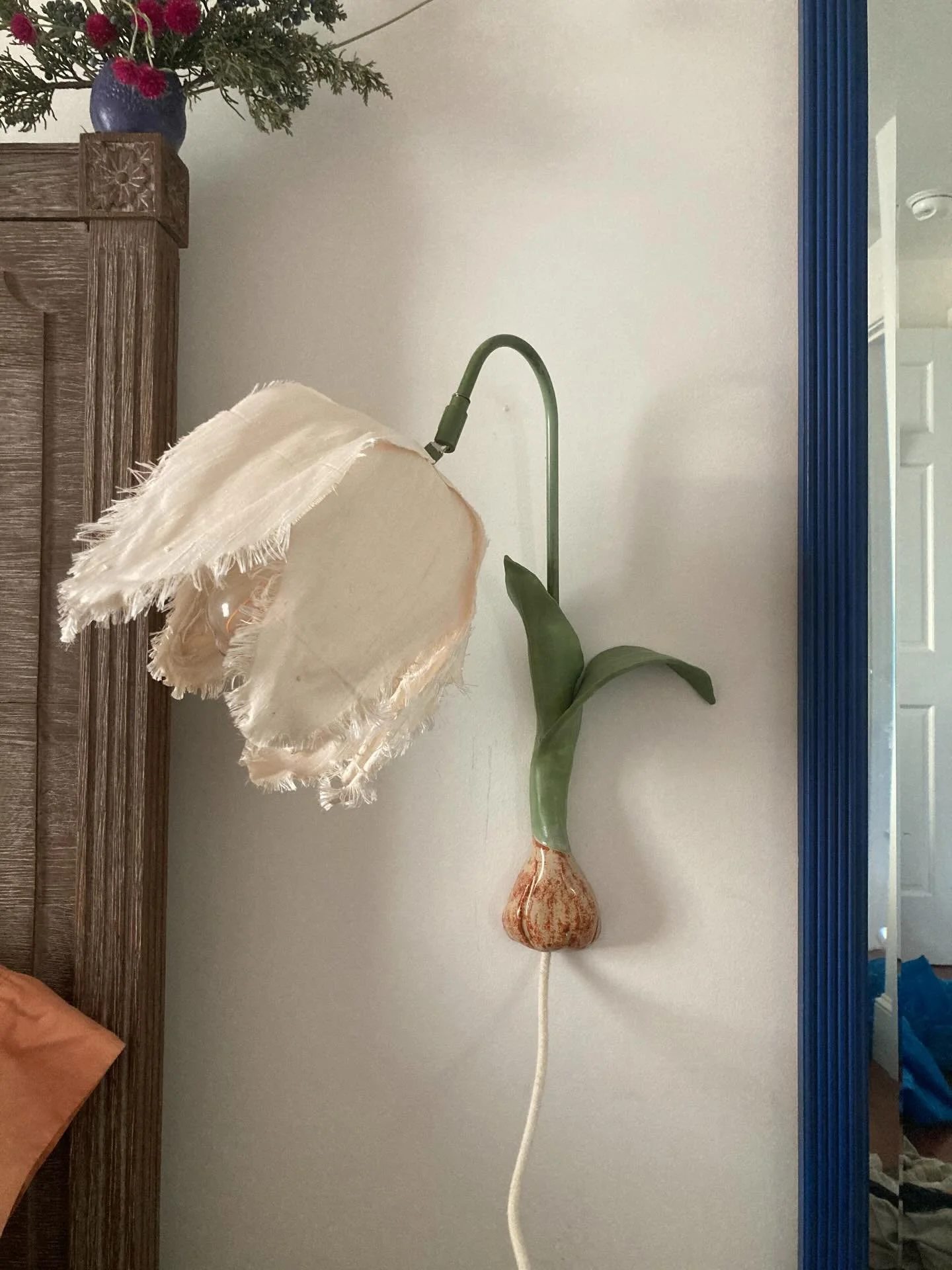 Feels right that this project is finally finished in January with 2 feet of snow on the way! I imagined this lamp, formed the bulb and leaves in clay, sewed the shade, painted the hardware(with nail polish) beginning two years ago. After planting all