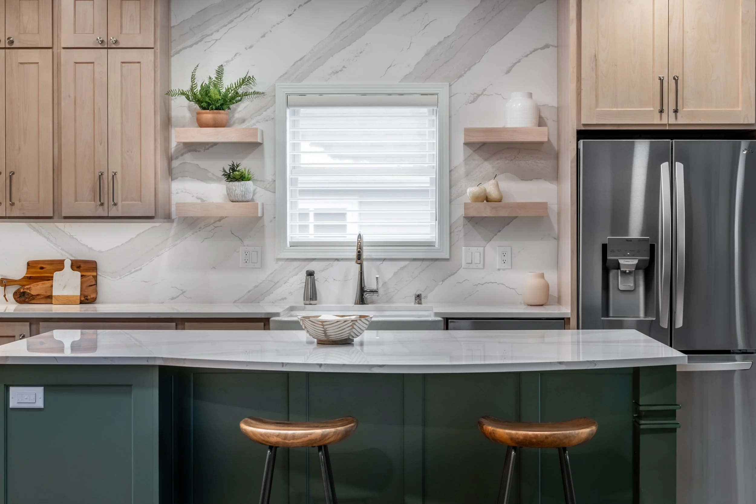 The Countertops, and Backlash are Cambria Inverness Swansea 3CM Quartz Backsplash