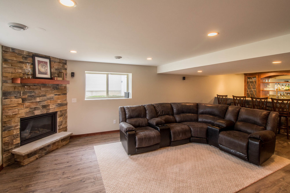 Remodeled Basement With Wet Bar, How To Build A Fireplace In Basement