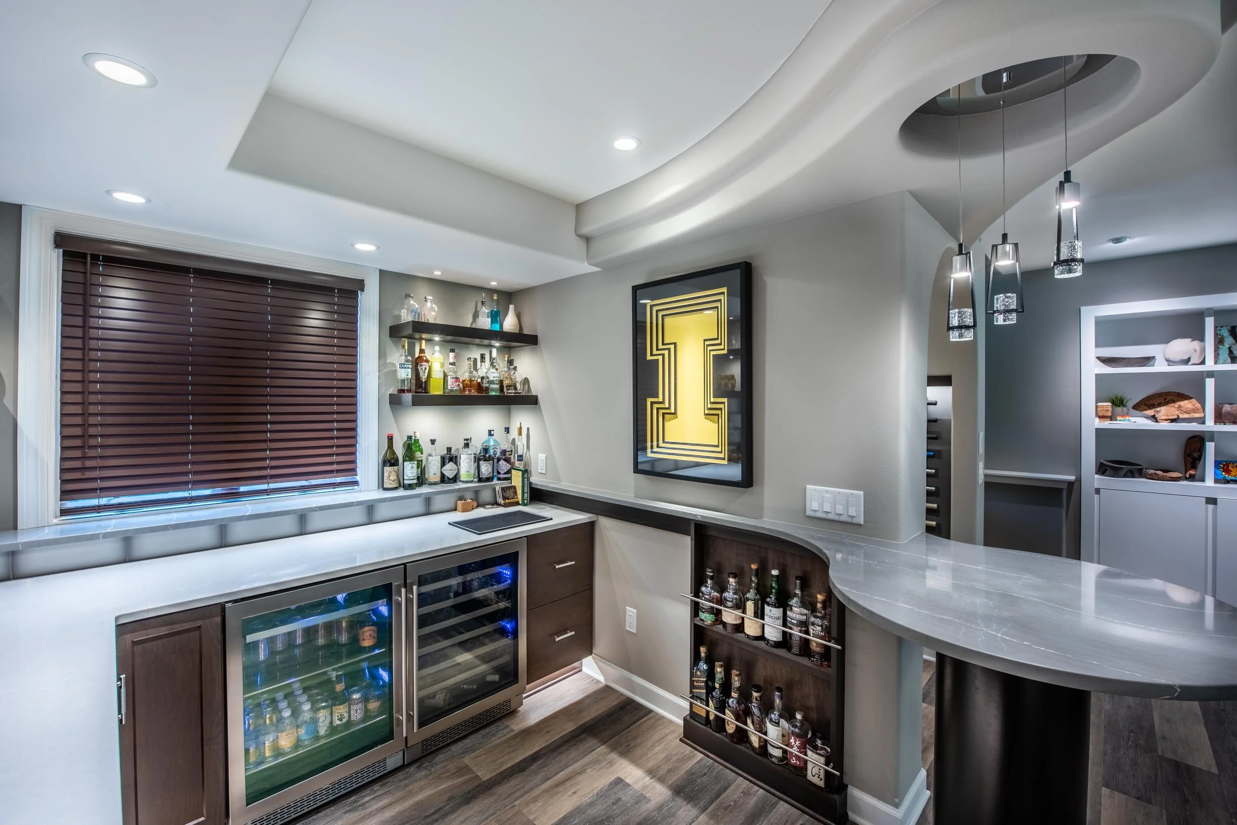 Split-Level Home Bar Design With Before and After Images