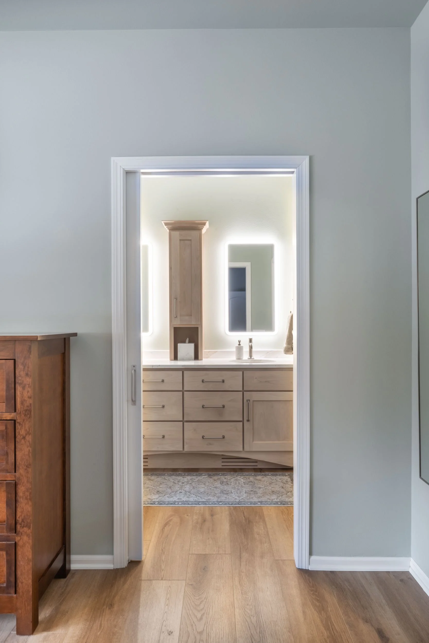 Walls within the bathroom were removed to create an open floor plan.