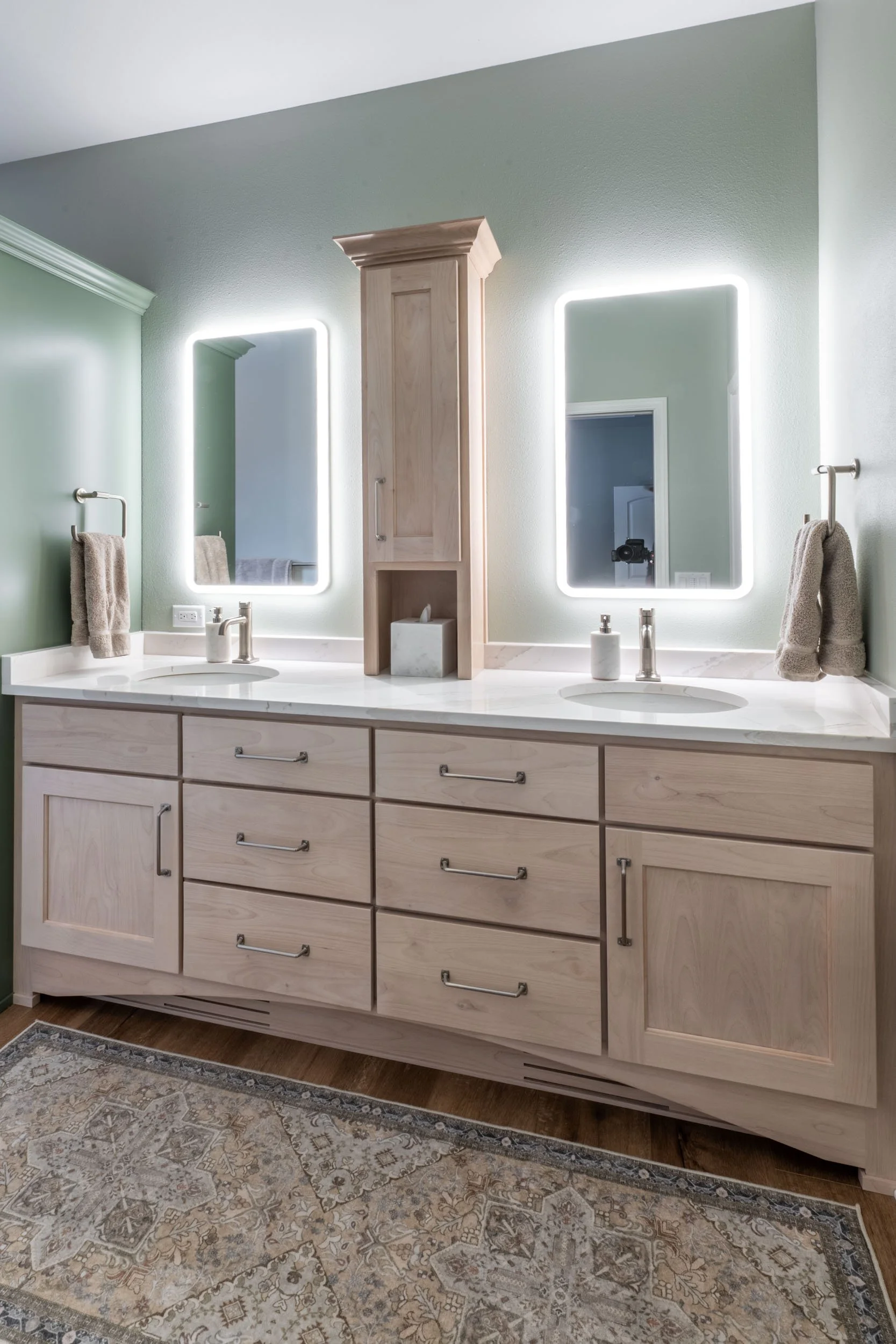 The sink faucet is a Kohler Venza in brushed nickel.