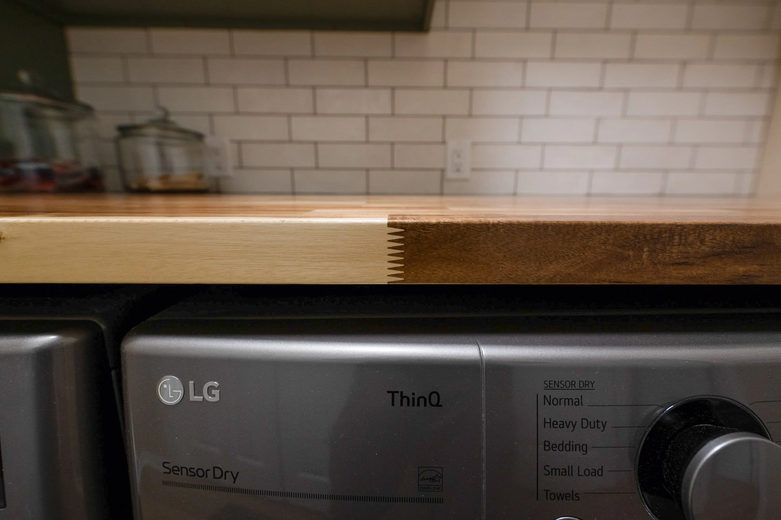 A detail view of the wooden countertop joinery.