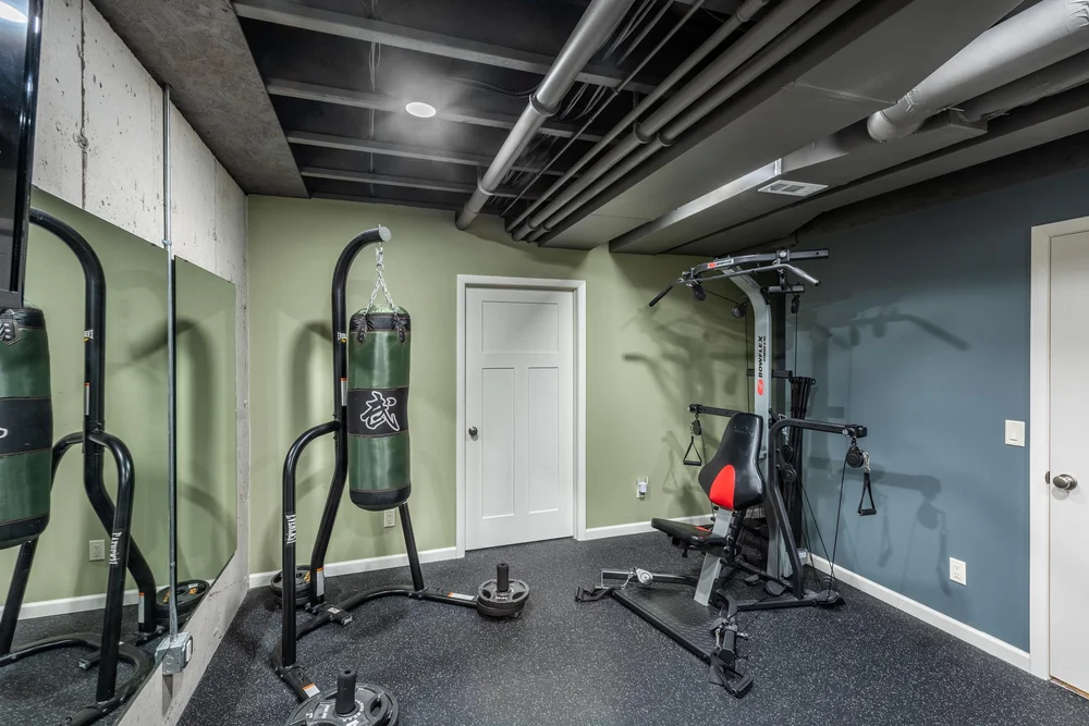A Remodeled Finished Basement and Exercise Room — Degnan DesignBuild