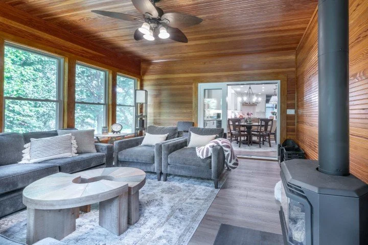 A porch converted to a heated insulated indoor-outdoor room
