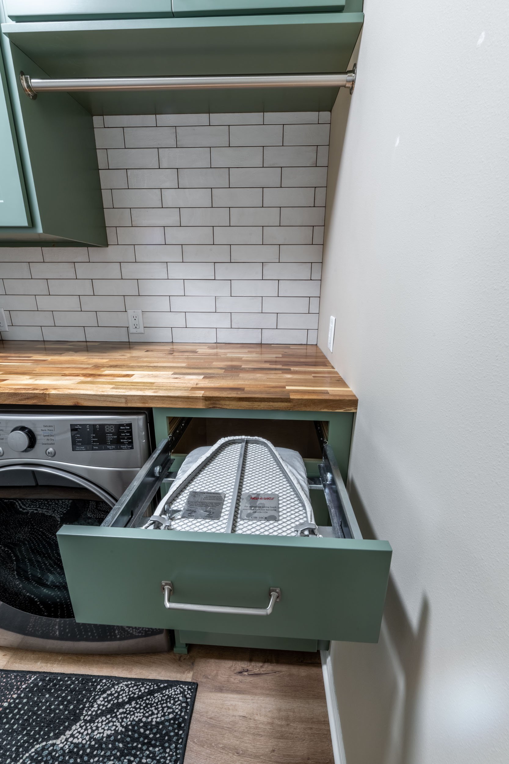 A view of the ironing board in its folded position.