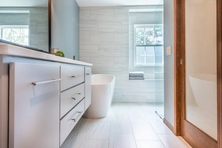 Floating vanity in wet room bathroom