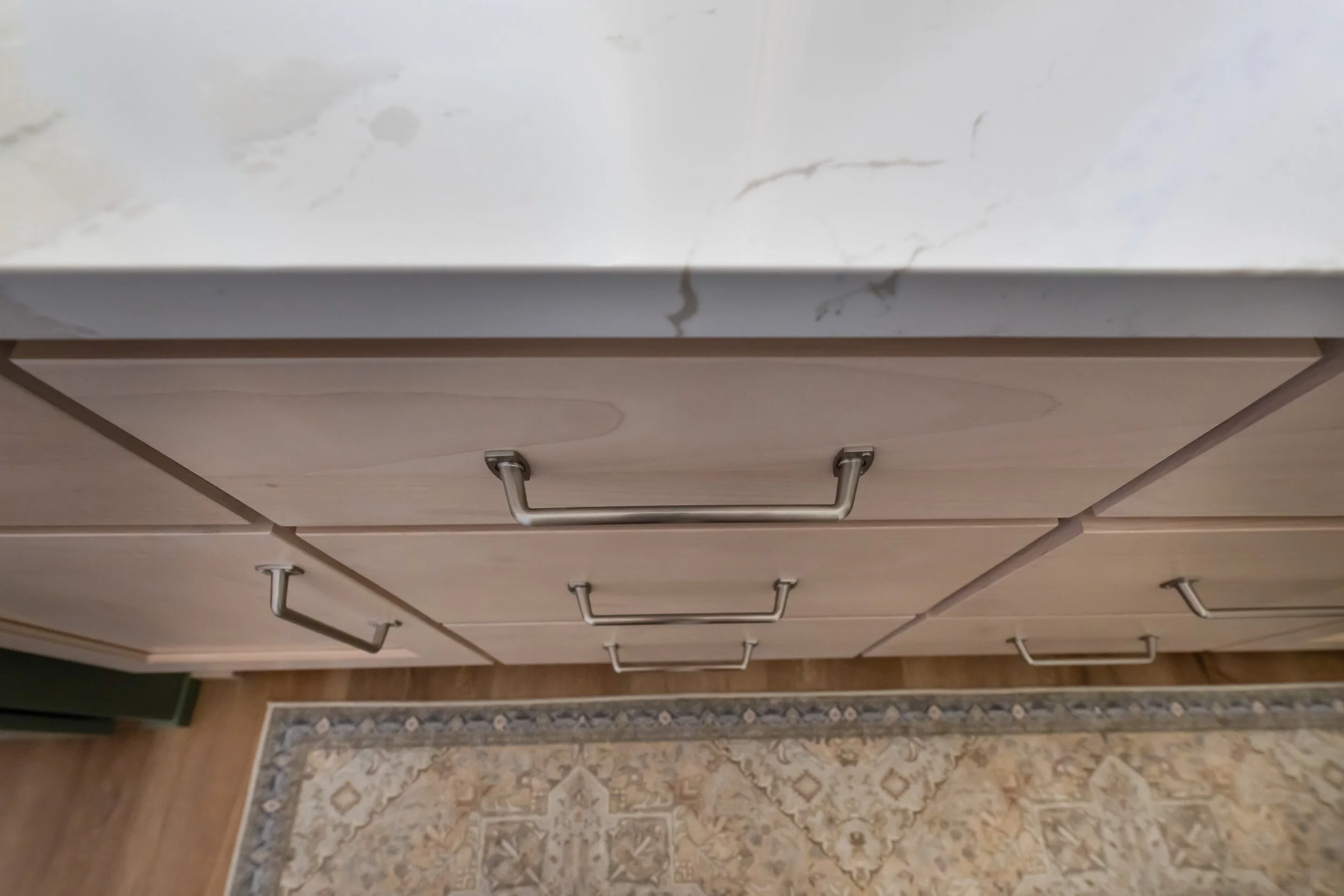 Cabinet hardware is the Amerock Rochdale collection, satin nickel finish.