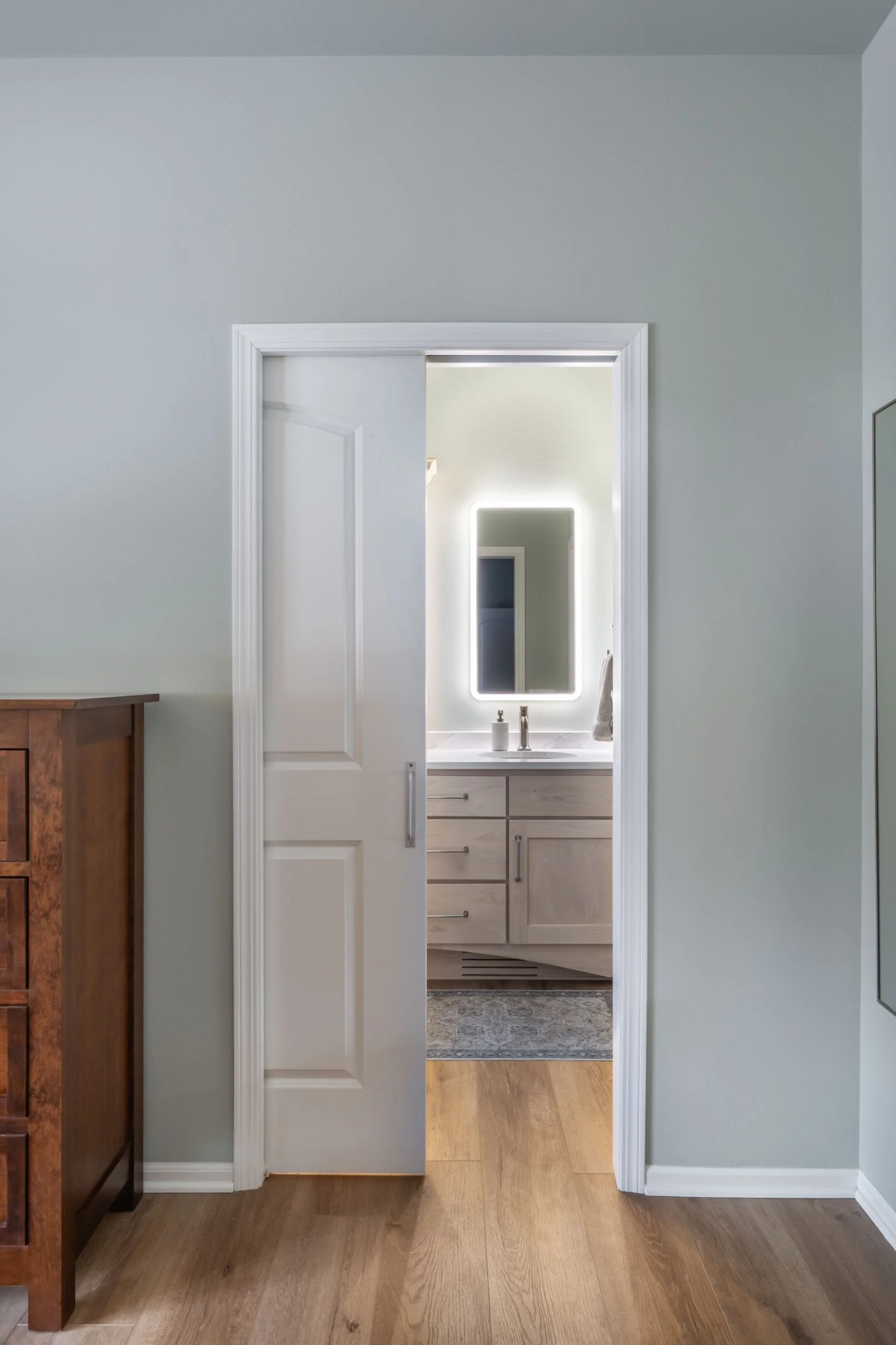 The pocket door was part of the redesigned floor plan.