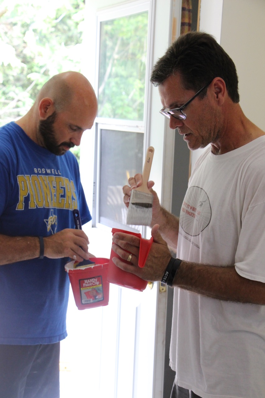 Praying over the paint.jpg