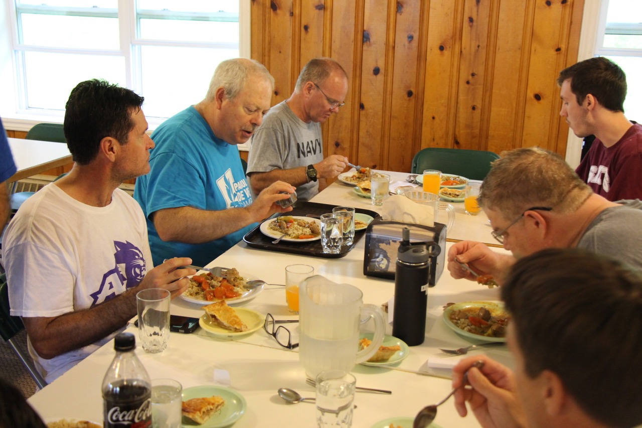 Ray eating with team.jpg