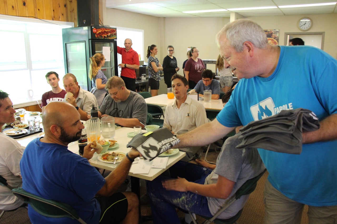 Ray handing out shirts.jpg