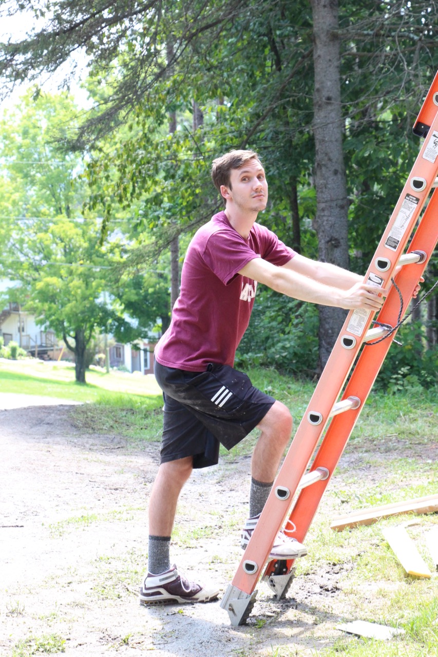 Ryan holding ladder.jpg