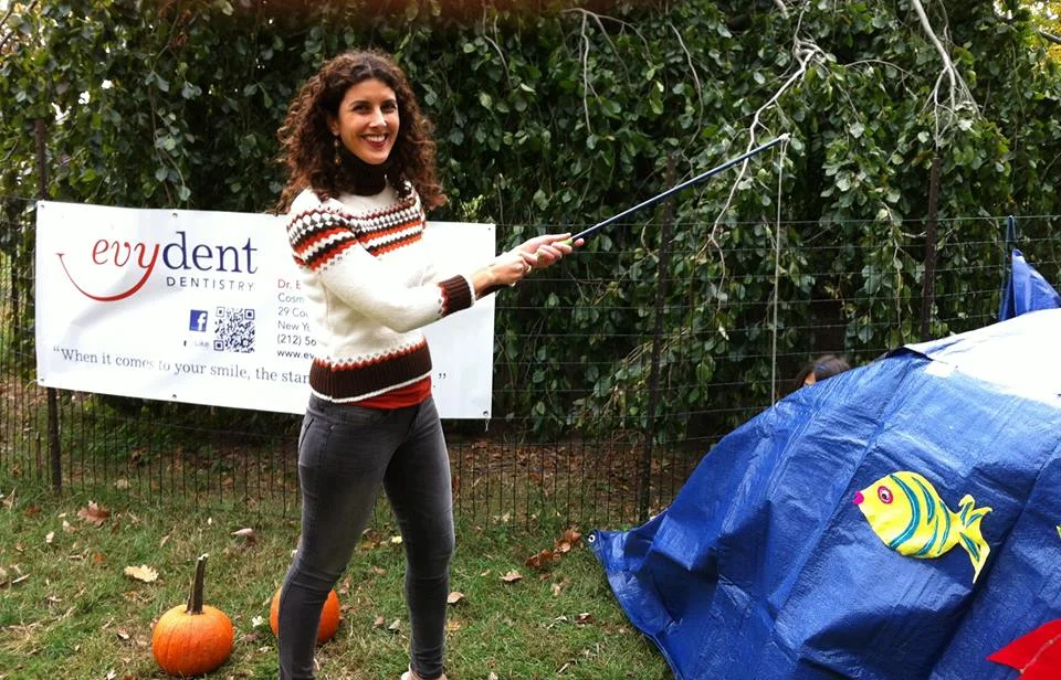 Evy Fishing for Toothbrushes at the Harvest Festival