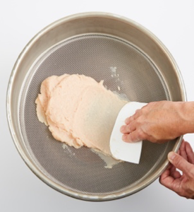 Sieving a Mousseline Forcemeat Through a Tamis