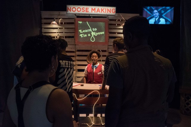 Audience members learn how to make a noose during the ”Atrocity Carnival.”SOURCE COURTESY OF 3/FIFTHS / JAMES SCRUGGS