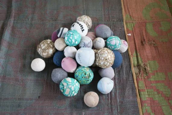 Sponge balls made by South Sudanese from patterns donated by UNICEF. Balls can be used for a number of games: hide and seek, catch, or simply to bounce.