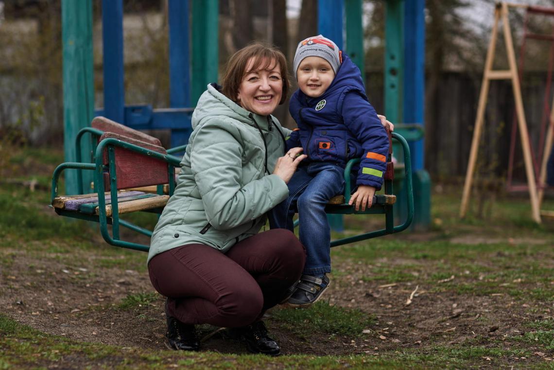 Svitlana Ovdiy plays with her son Kyrylo, 3, a tetanus survivor, near their house outside Kyiv. The infection put Kyrylo in a medically-induced coma, and he spent 50 days in the hospital. “When he heard my voice... he started crying, calling for help, but there was nothing more I could do,” Svitlana recalls. “Now vaccination is a top priority issue in our family.”