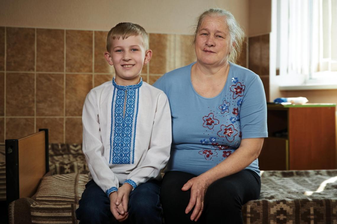 Hanna Prokopyshyn sits with her grandson Dmytro, 9, in the hospital where he receives treatment for bronchial asthma. Dmytro’s parents initially were afraid to vaccinate their son due to his condition – a concern doctors dispelled, especially amid Ukraine’s measles outbreak. Dmytro has already successfully received the first dose of the MMR vaccine and his parents plan to follow the National Immunization Schedule.